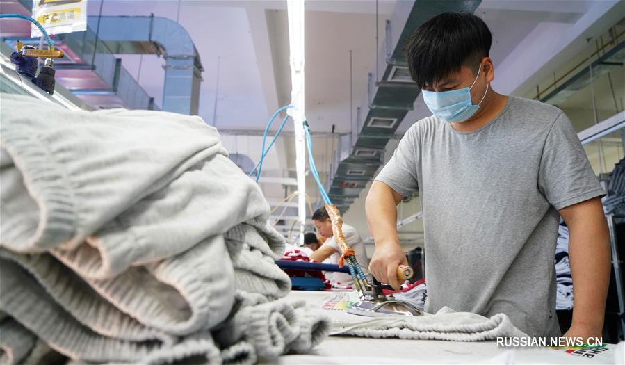 Модернизация швейной промышленности в районе Циншаньху провинции Цзянси