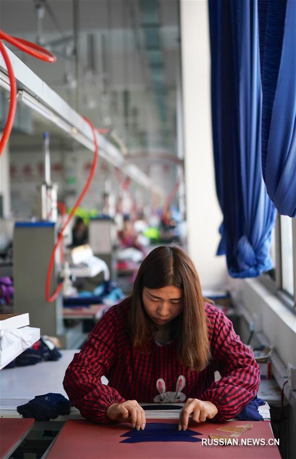 Модернизация швейной промышленности в районе Циншаньху провинции Цзянси