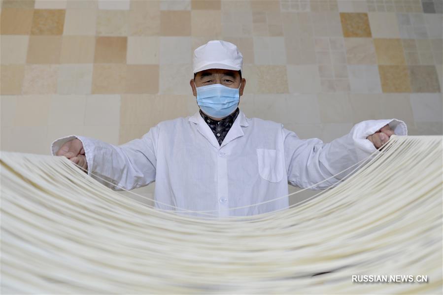 Сделанная вручную лапша гуамянь из провинции Хэбэй