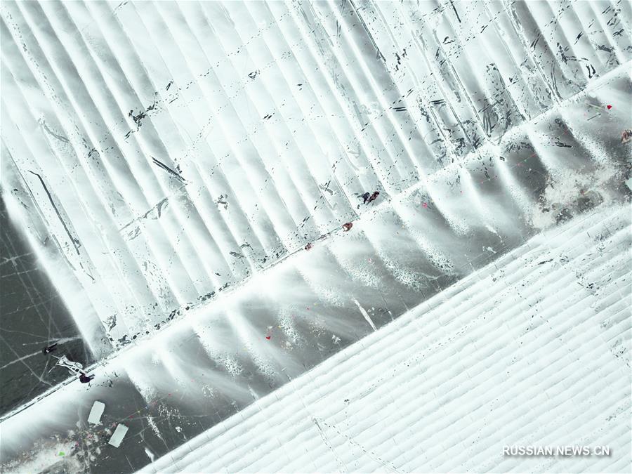 Заготовка строительного материала для парка "Мир льда и снега" в Харбине