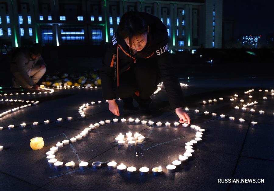 "Панихида зажженных свечей" в память о жертвах Нанкинской массовой резни