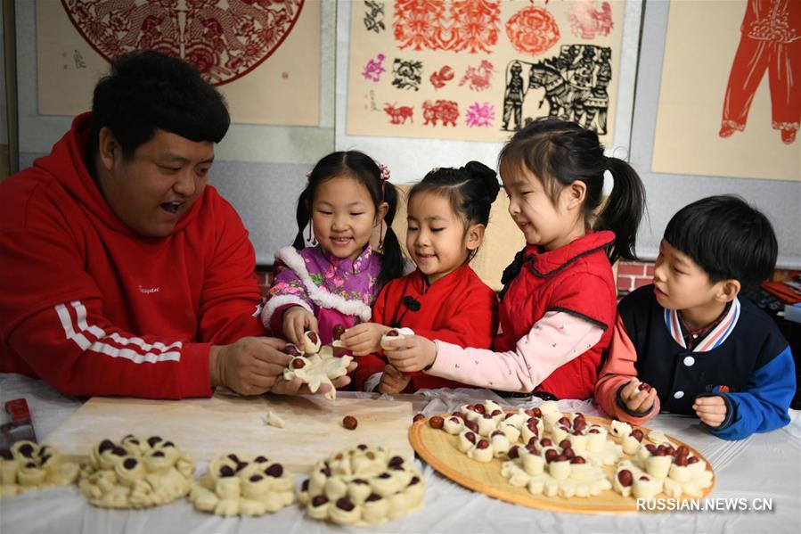 В Китае встречают "малый новогодний сочельник"