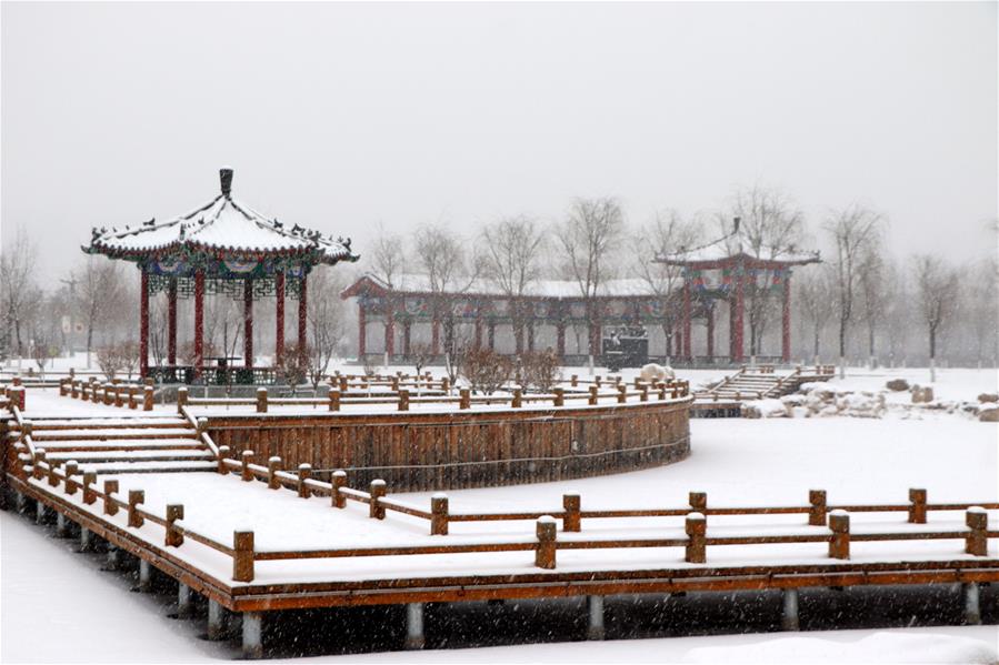 Весенний снег за Великой стеной