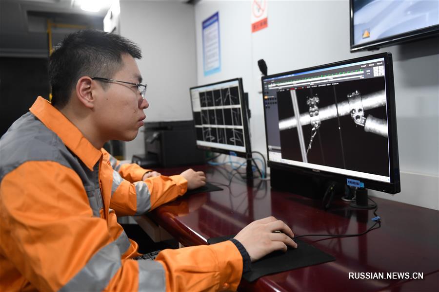 Инженеры проводят проверку на ВСЖД Ханчжоу-Хуаншань