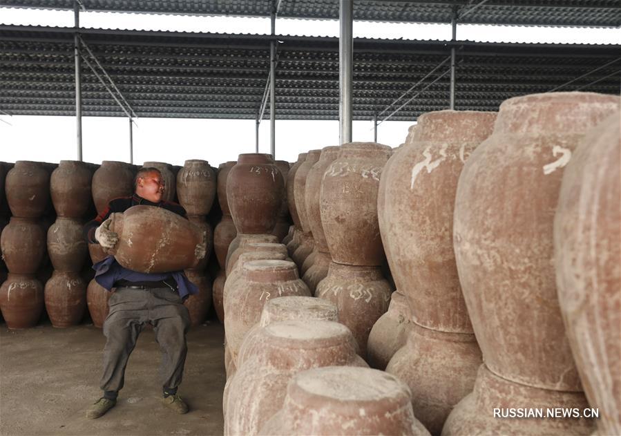 Производство квашеной овощной горчицы в Чунцине