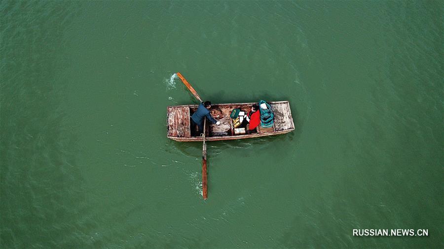 Почтальон на лодке из Восточного Китая