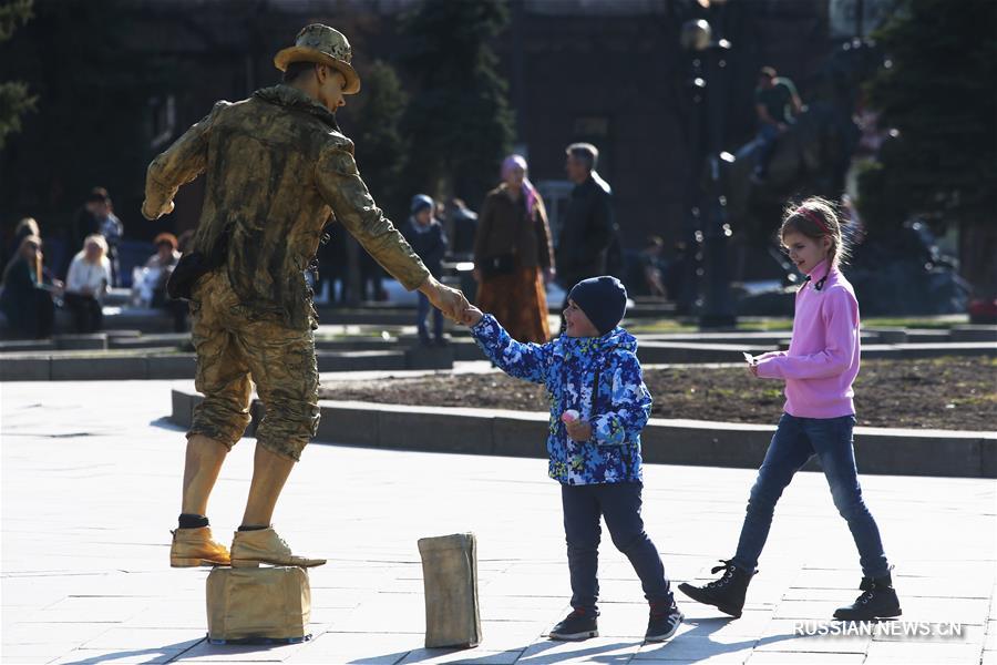 Накануне первого тура президентских выборов в Киев пришла весна