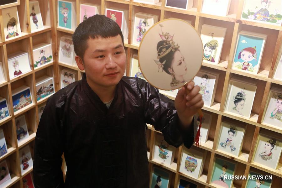 Молодой иллюстратор из провинции Гуйчжоу -- хранитель народной культуры