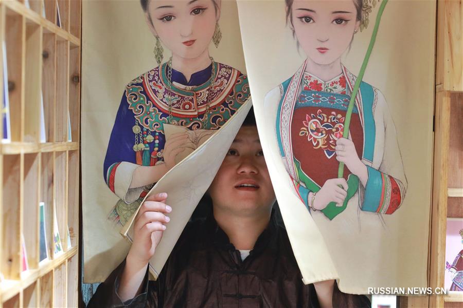 Молодой иллюстратор из провинции Гуйчжоу -- хранитель народной культуры