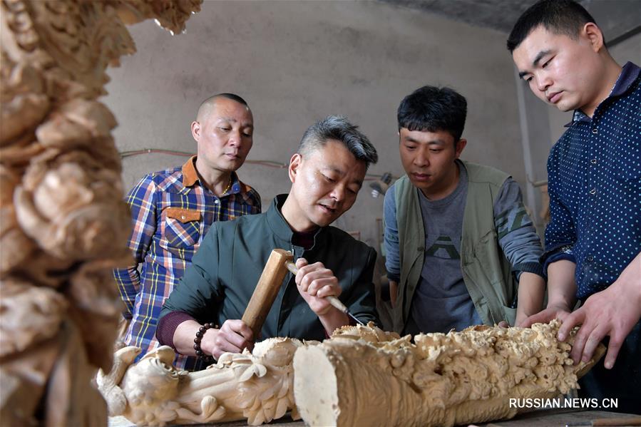 Развитие ремесла резьбы по дереву в провинции Цзянси