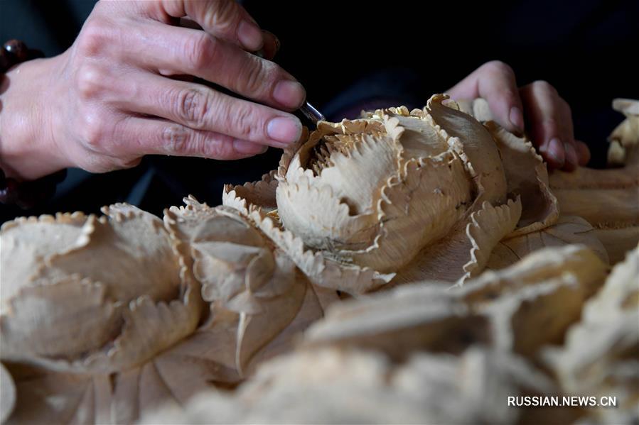 Развитие ремесла резьбы по дереву в провинции Цзянси
