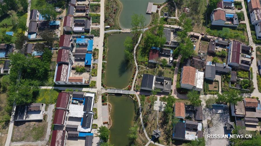 От обработки отходов к защите окружающей среде -- трансформация поселка в провинции Цзянсу