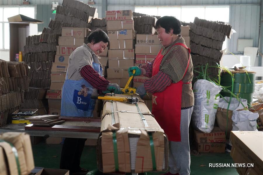 От обработки отходов к защите окружающей среде -- трансформация поселка в провинции Цзянсу