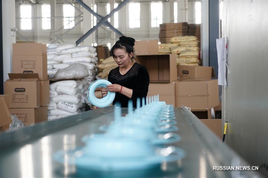 От обработки отходов к защите окружающей среде -- трансформация поселка в провинции Цзянсу