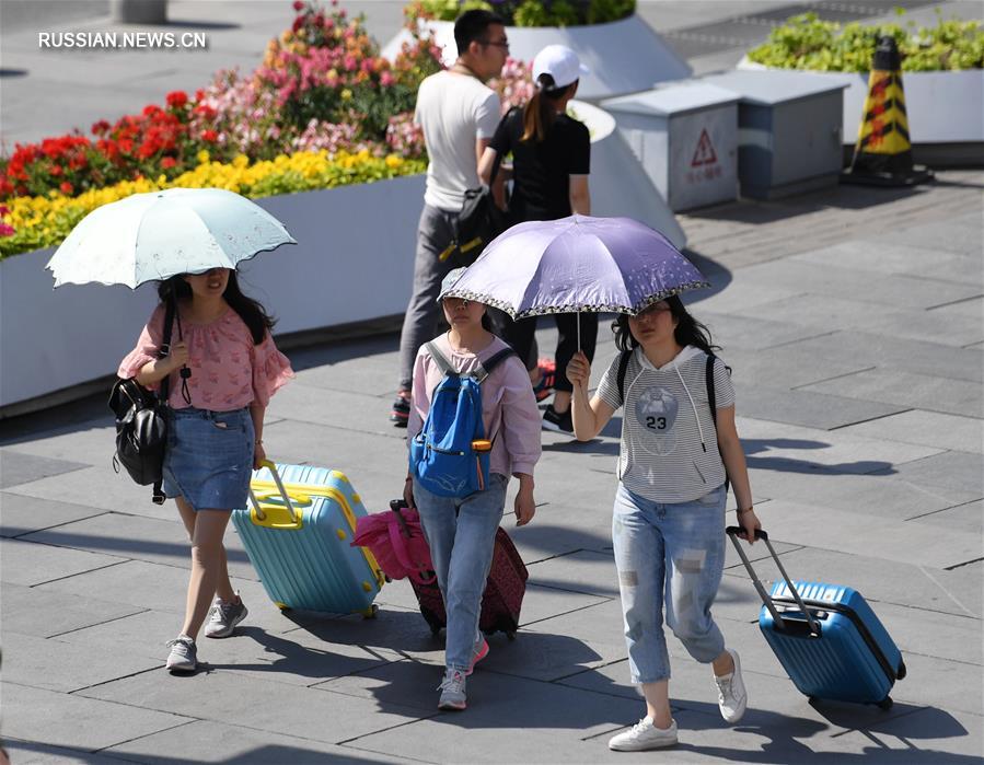 В Пекине из-за знойной жары объявлено "желтое" предупреждение