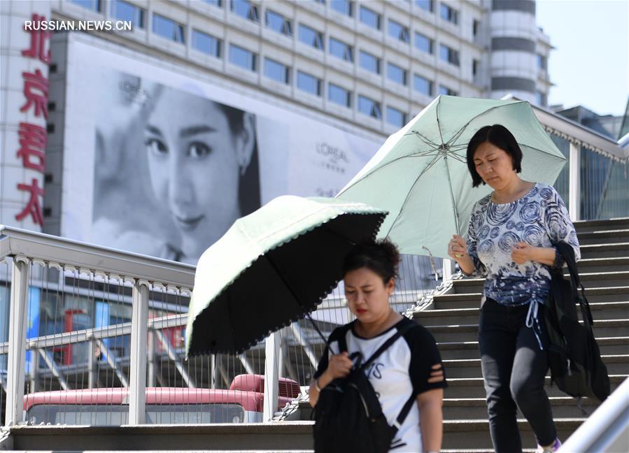 В Пекине из-за знойной жары объявлено "желтое" предупреждение