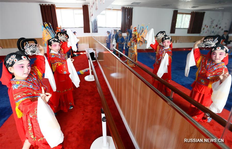 Живое наследие традиционной китайской оперы в одной из школ Циндао
