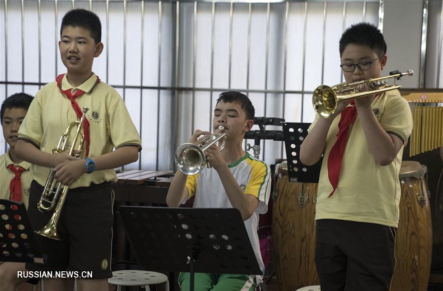 Музыка и дружба словно солнечный свет -- Концерт маленьких музыкантов из Чунцина в Пекине