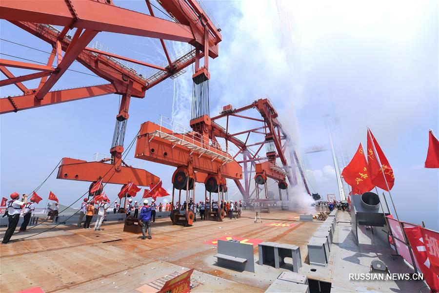 Выполнено смыкание основного участка Пинтаньского автомобильно-железнодорожного моста