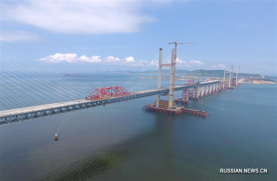 Выполнено смыкание основного участка Пинтаньского автомобильно-железнодорожного моста