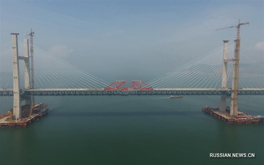 Выполнено смыкание основного участка Пинтаньского автомобильно-железнодорожного моста