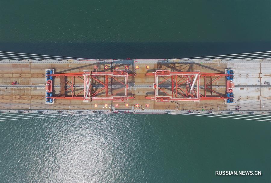 Выполнено смыкание основного участка Пинтаньского автомобильно-железнодорожного моста