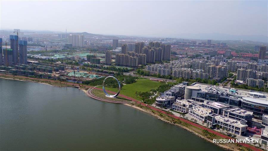 Болото превратилось в озеро "Цветов вишни" на востоке Китая