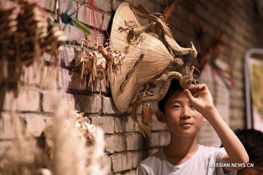 Хань Люе -- продолжатель традиций искусства плетения из соломки 