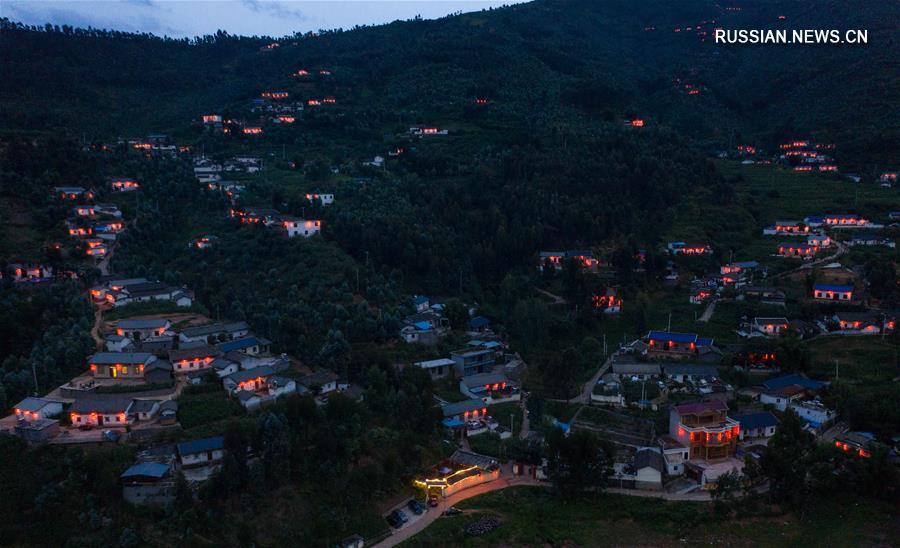 Ночь огненного веселья в уезде Ляншань провинции Сычуань