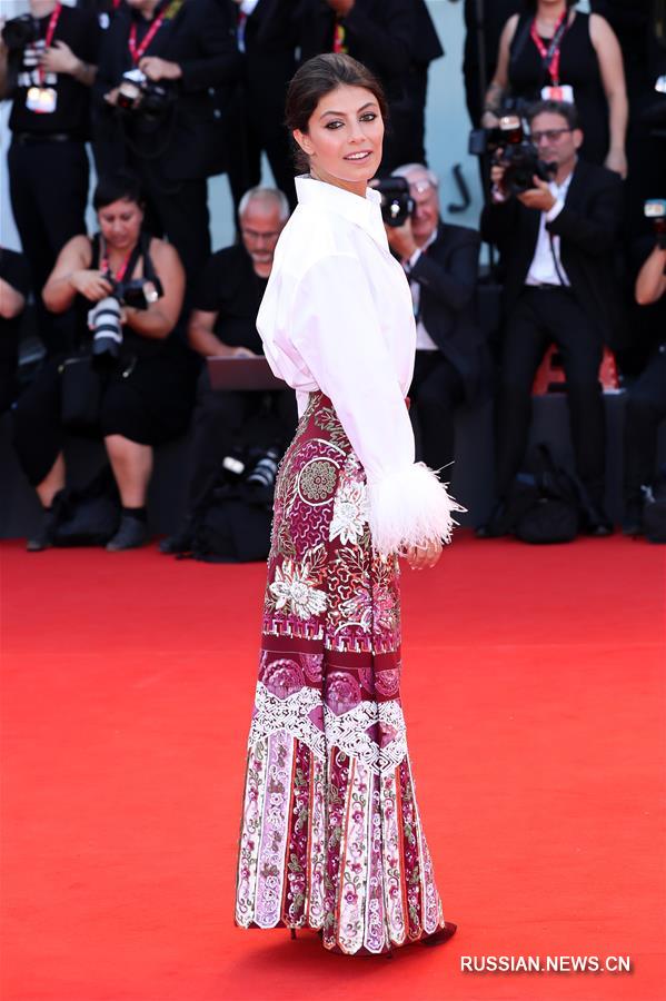 Венецианский кинофестиваль: модный показ на красной ковровой дорожке 