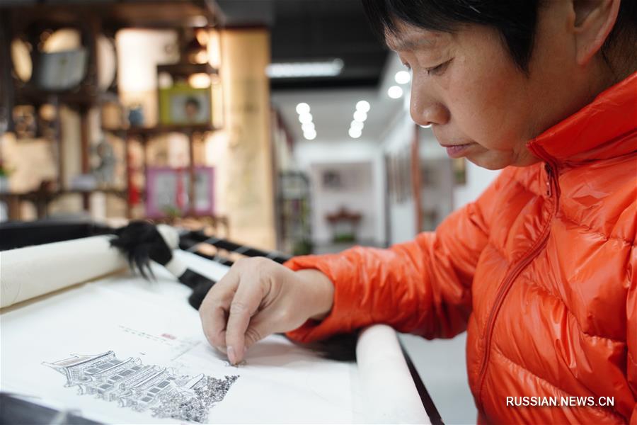 Традиционная вышивка волосами из провинции Цзянси