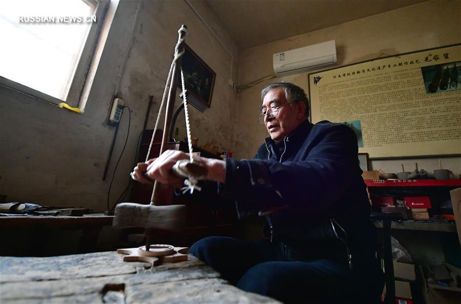 Создатель флейт "шэн" из провинции Хэнань
