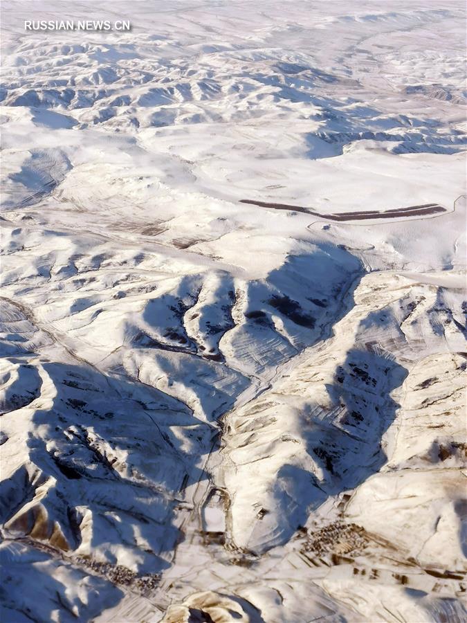 Просторы Внутренней Монголии после снегопада
