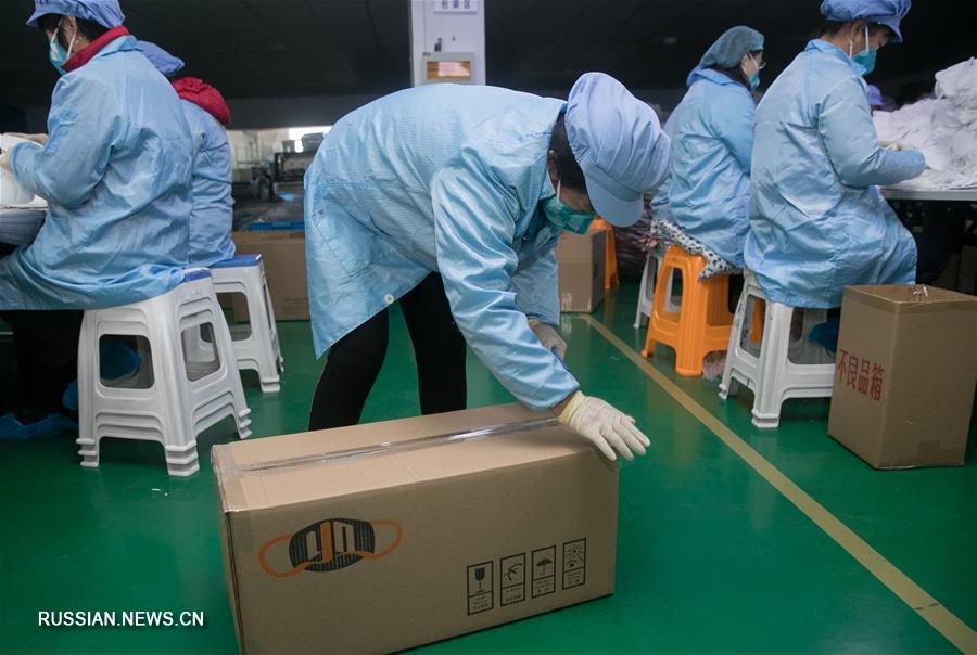 В Шанхае увеличили производство защитных масок