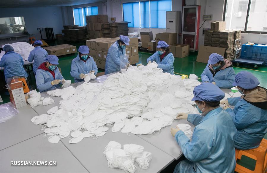 В Шанхае увеличили производство защитных масок