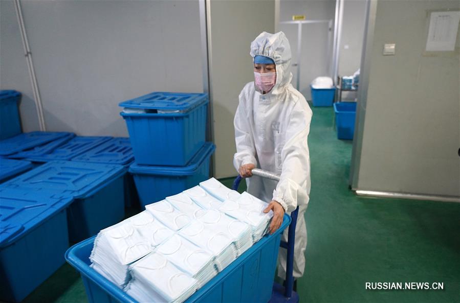 На предприятиях по производству медицинских защитных средств пров. Цзянси полным ходом идет работа с целью обеспечения поставок продукции на рынок