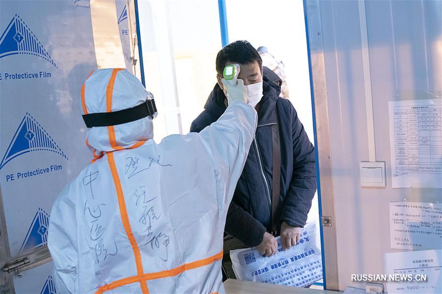 Борьба со вспышкой коронавирусной инфекции -- Работа импровизированных больниц в Ухане