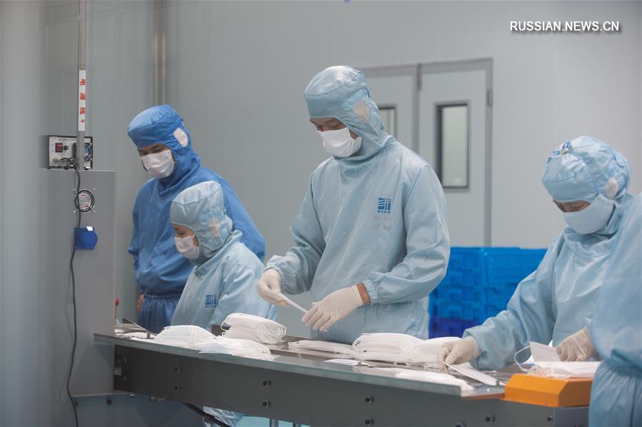 Борьба со вспышкой коронавирусной инфекции -- В провинции Хайнань запущена первая линия по производству медицинских масок