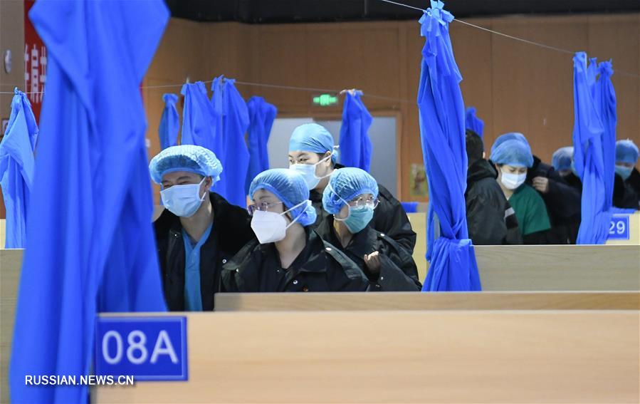 Борьба со вспышкой коронавирусной инфекции -- Первый в Ухане импровизированный стационар для лечения коронавирусной пнемонии методами ТКМ начал принимать пациентов