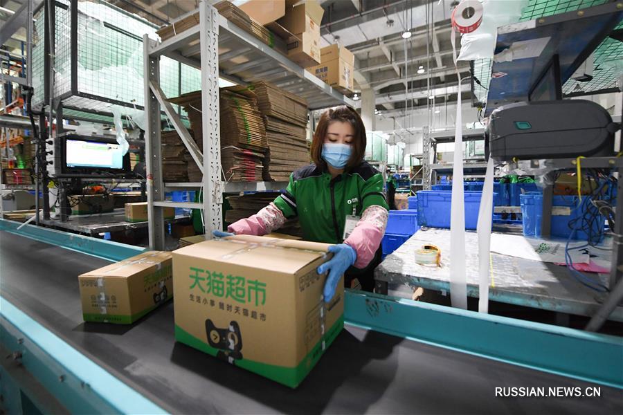 Борьба со вспышкой коронавирусной инфекции -- Пекинские логистические компании возобновляют работу