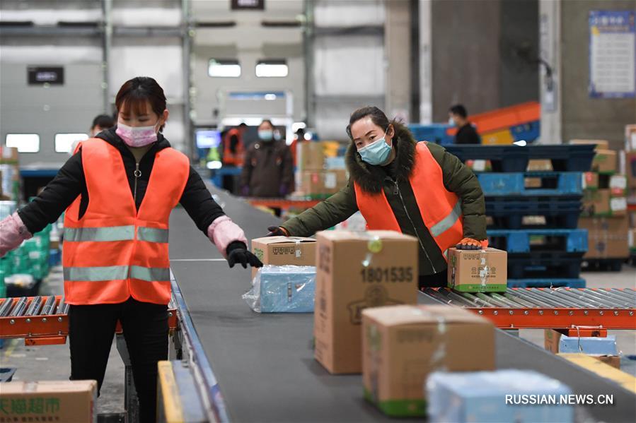 Борьба со вспышкой коронавирусной инфекции -- Пекинские логистические компании возобновляют работу