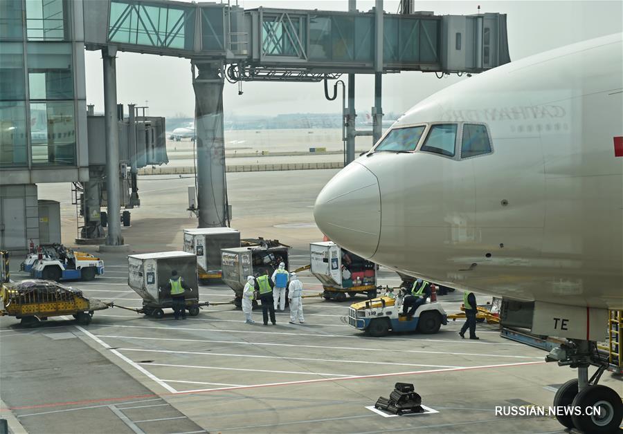 В международном аэропорту Пекина введен строгий карантинный режим в отношении въезжающих пассажиров 