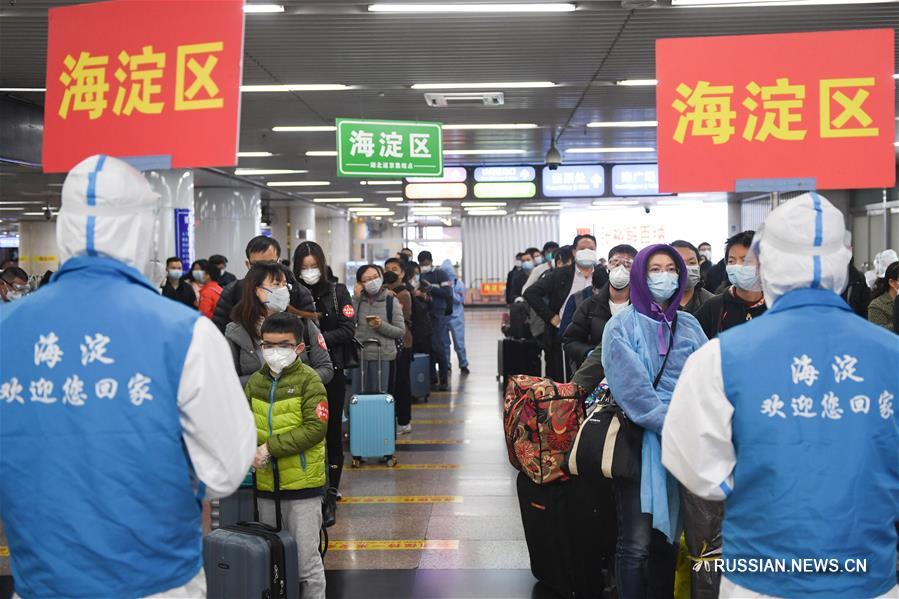 Первый поезд из "открытого" Уханя прибыл на вокзал "Пекин-Запад"