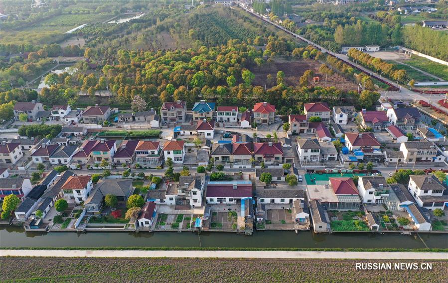 Восточнокитайский город Чжэньцзян прилагает огромные усилия для  продвижения строительства красивых и пригодных для жизни деревень и поселков