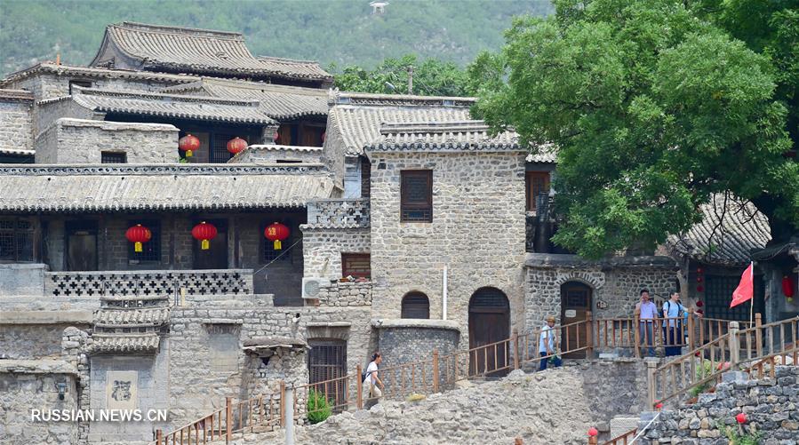 Охрана традиционных поселений и развитие сельского туризма в уезде Цзинсин