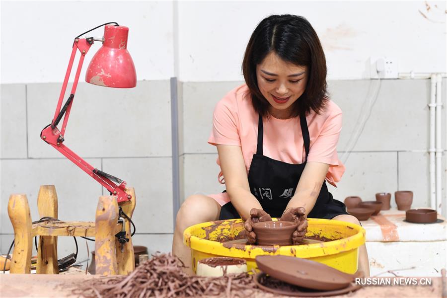 Поселок Аньтао на юго-западе Китая привлекает большое число туристов