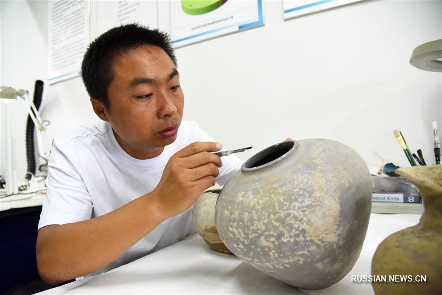 Началась реставрация археологических находок, сделанных при восстановлении русла реки Сяоцинхэ 