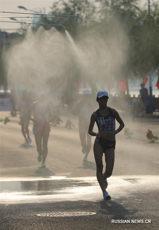 Легкая атлетика -- Национальное пригласительное соревнование по спортивной ходьбе в Цзиньчжоу: обзор женского захода на 20 км