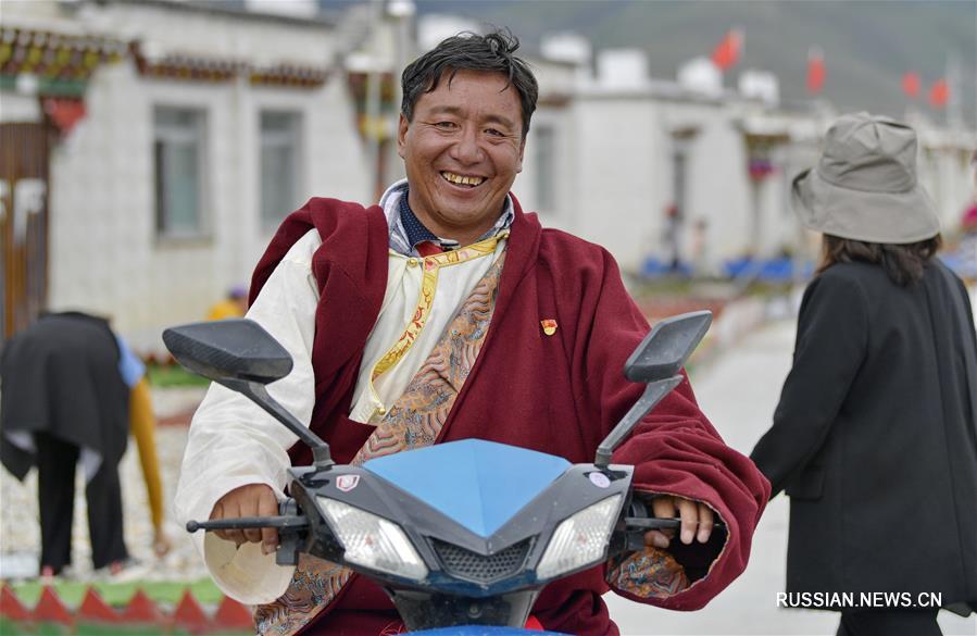 Переезд на новое место -- путь к среднезажиточному обществу в Тибетском АР