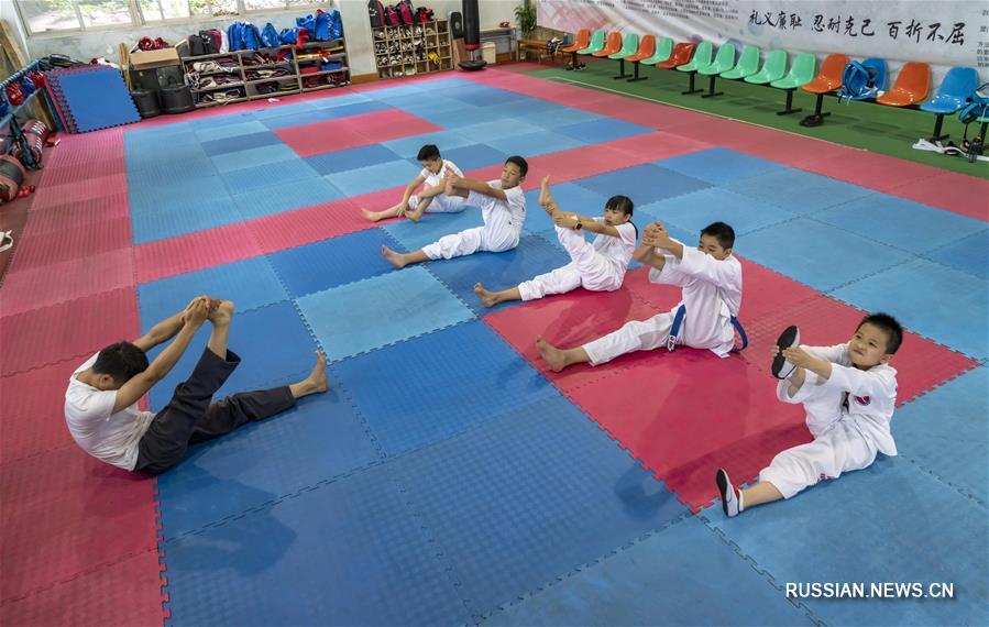 В куньминском детско-юношеском спортивном клубе работают детские секции